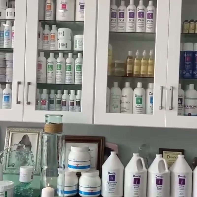 Roman's N Care salon display of Dudley's hair care products